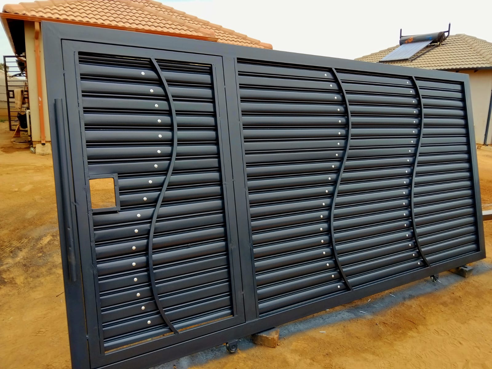 Modern Black Steel Sliding Gate Installation | Business | Nato welding | YESODI