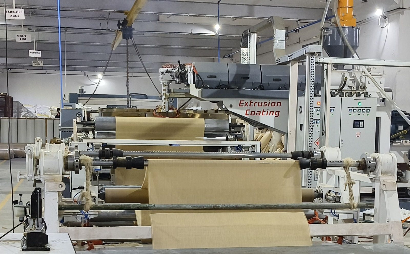 A bolt or roll of woven jute fabric with a tan and brown natural fiber texture.